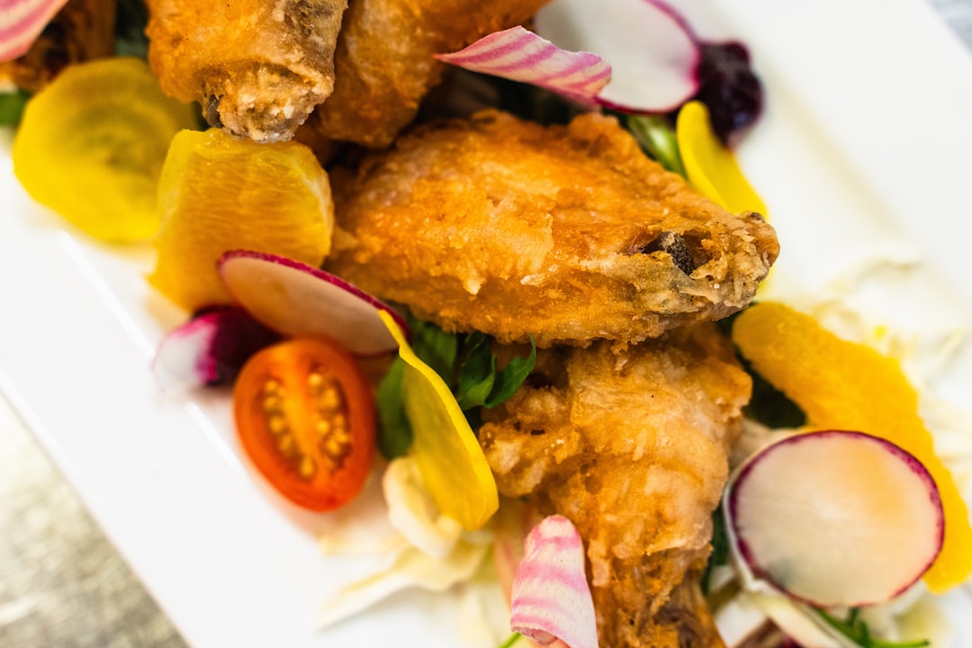 crispy chicken wings platter - Photo by Matthew Sichkaruk on Unsplash