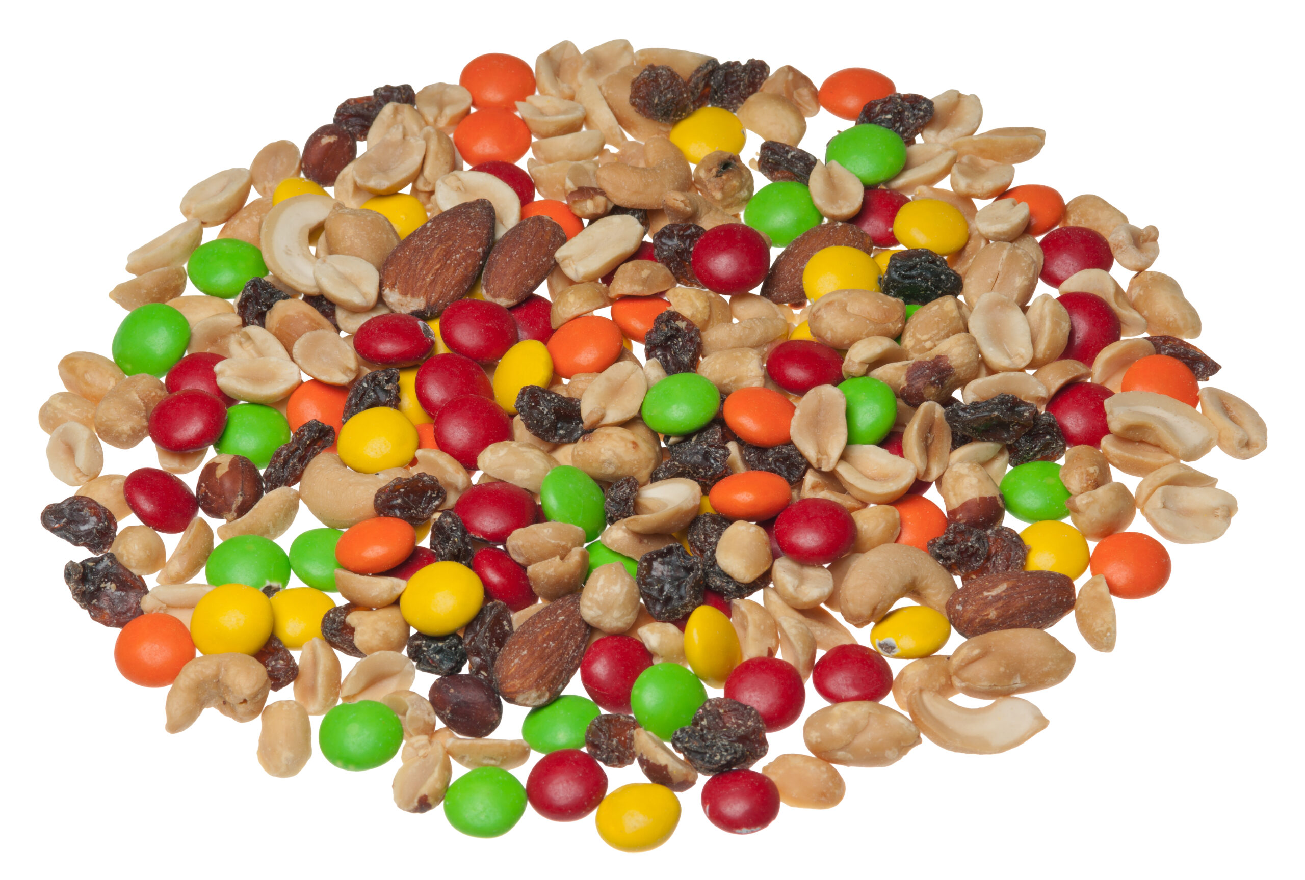 A bowl of mixed nuts, raisins, pumpkin seeds and dark chocolate pieces on a counter